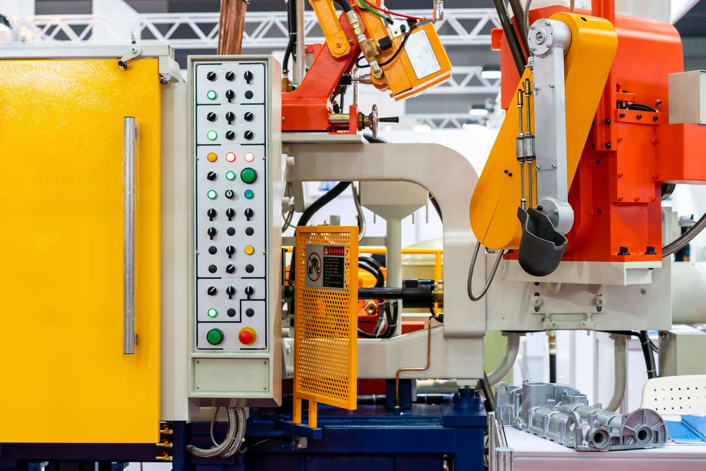 Close Up Ladle and Mechanical Arm of High Pressure Aluminum Die Cast Machine Image